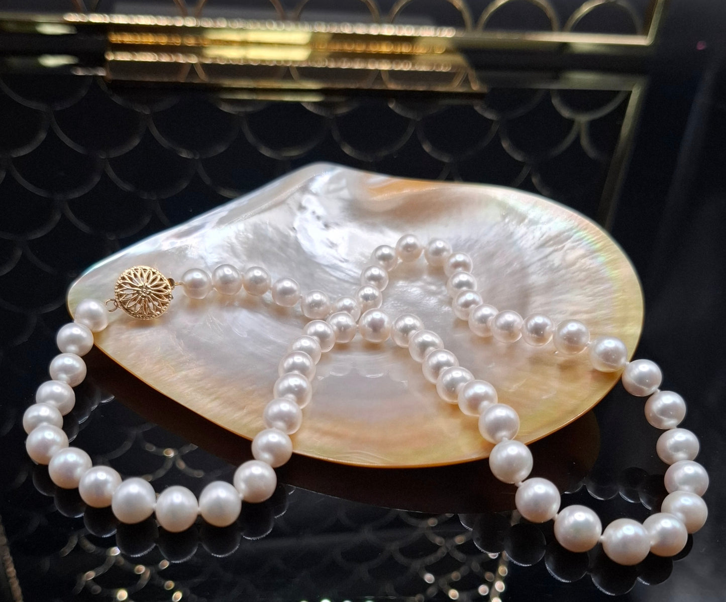 Freshwater white pearl necklace with filigree clasp