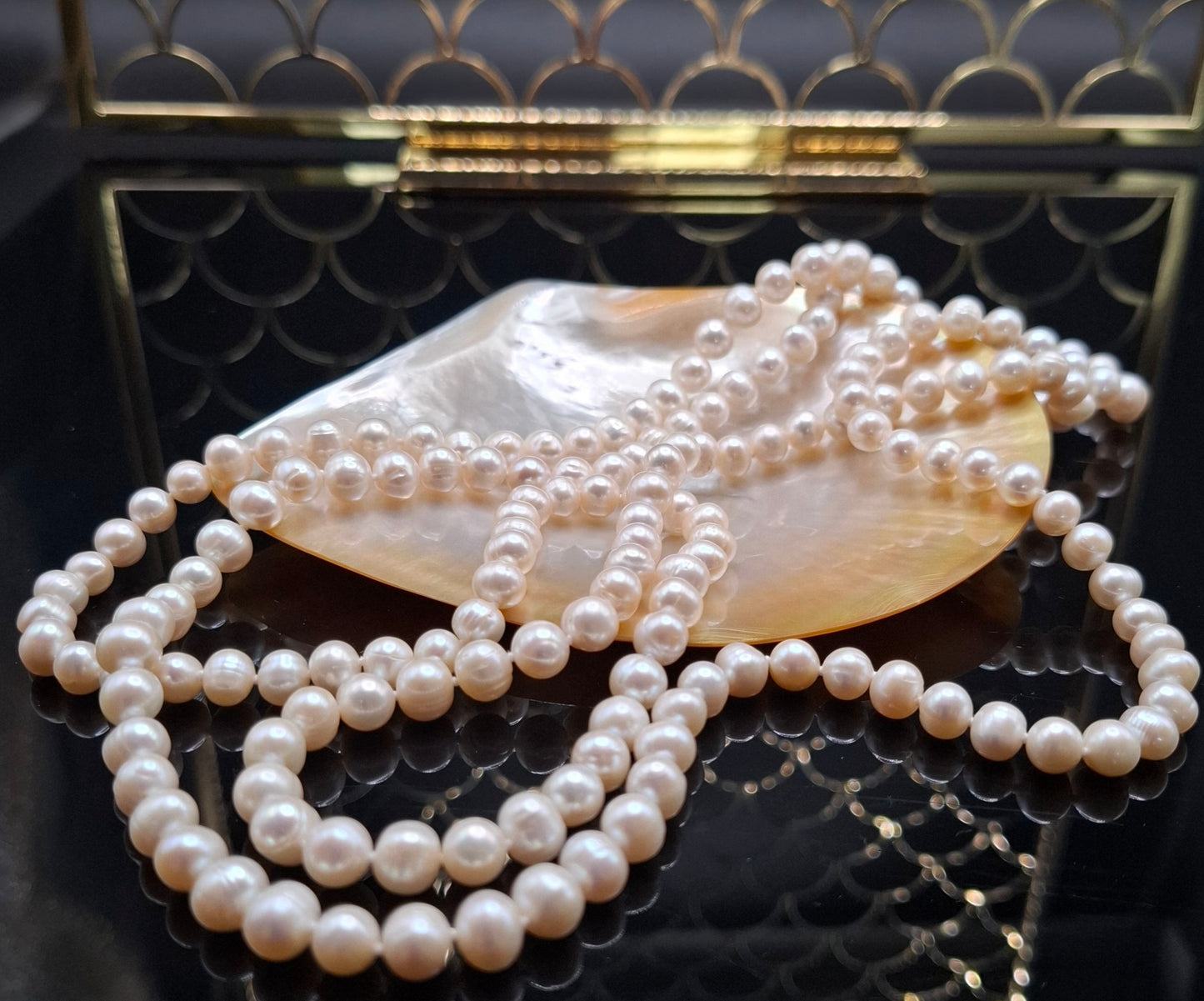 Freshwater near round 52 inch pearl necklace