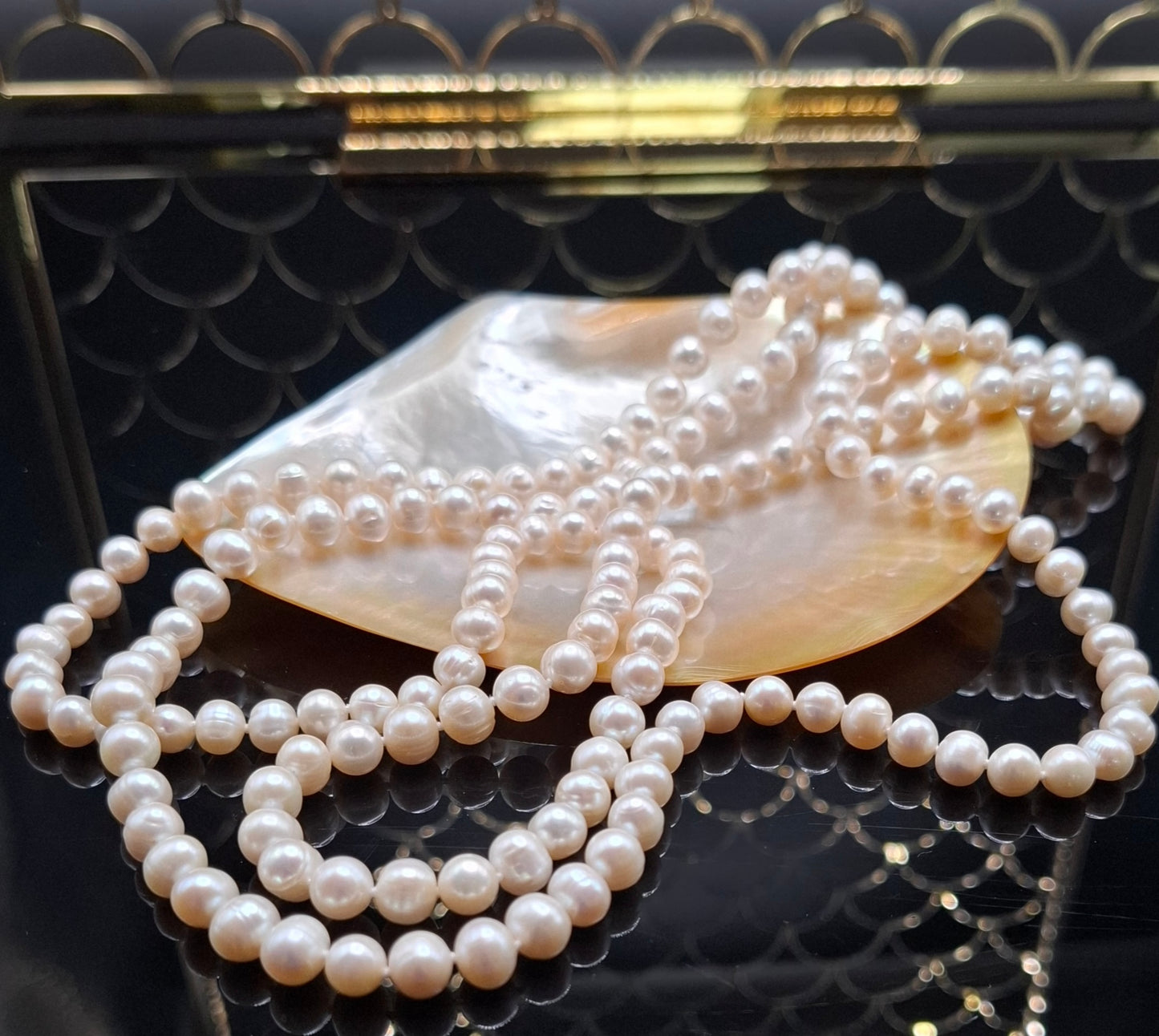 Freshwater near round 52 inch pearl necklace